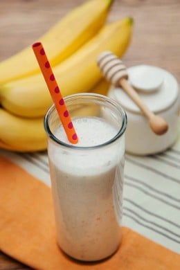 This simple Banana Date Smoothie is made with a combo of banana, dates, yogurt, honey, ice, and cinnamon, makes a refreshing and tasty concoction.