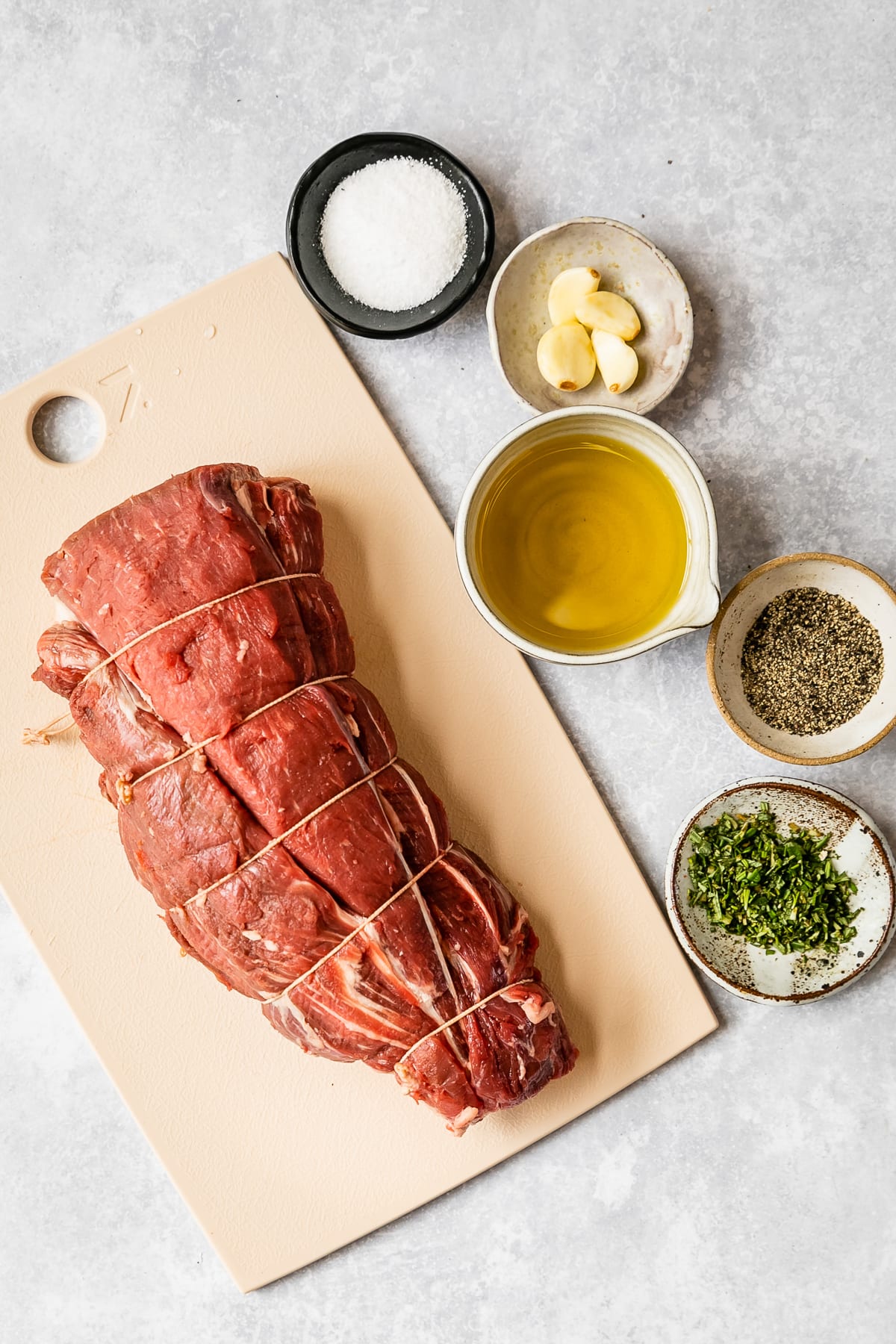 Beef, oil, garlic, rosemary, salt and black pepper