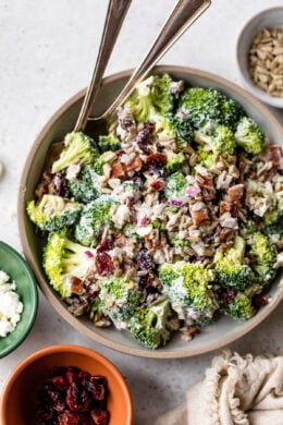 Broccoli Salad in a bowl with 2 spoons