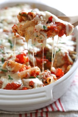 Penne baked with cheese, sauce and loaded with healthy vegetables in every bite. Roasted zucchini, red bell peppers, asparagus, red onion and fennel are tossed with balsamic and herbs then roasted for the best tasting meatless baked pasta dish EVER!