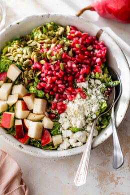 Shaved Brussels Sprouts Salad with Pears, Pomegranate and Pepitas