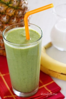 A skinny tropical green smoothie made with pineapple, shredded coconut and bananas, then blended with spinach, light coconut milk and Greek yogurt. High in Vitamin A, B-6, C, Manganese and fiber.